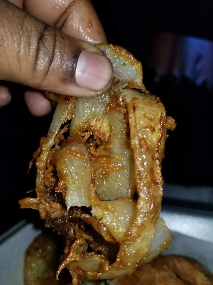 Chicken Botti Roll with Indian Sauce Served in Tortilla